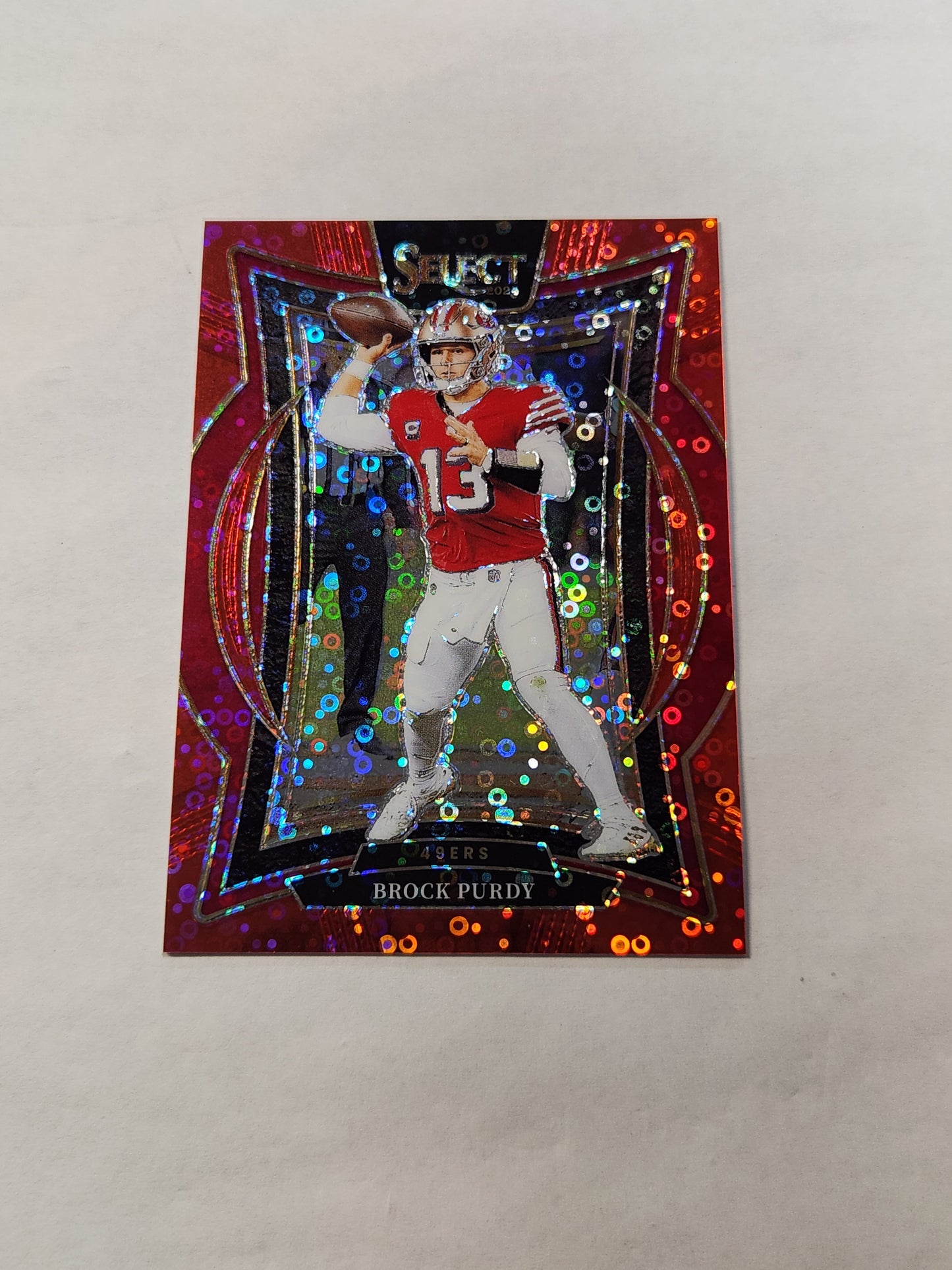 2024 Select Brock Purdy Concourse Red Disco No Huddle Prizm #/49 Jersey Color Match